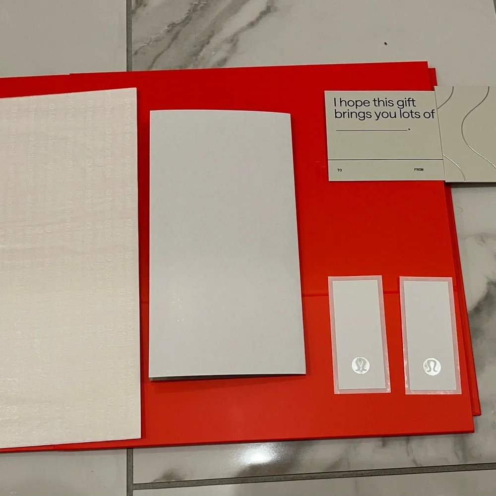 Lululemon — Vibrant Orange Decorative Gift Box.